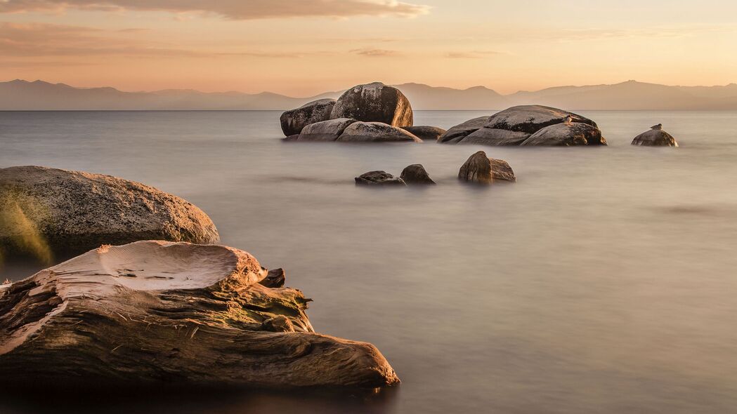 黄昏岩石海景，绝美4K高清壁纸，3840x2160分辨率下载