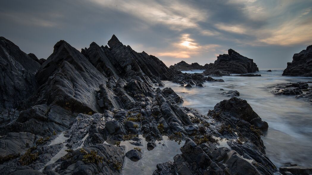 4K高清岩石海岸日落风景壁纸，大海之美，尽在3840x2160超清画质，一键下载