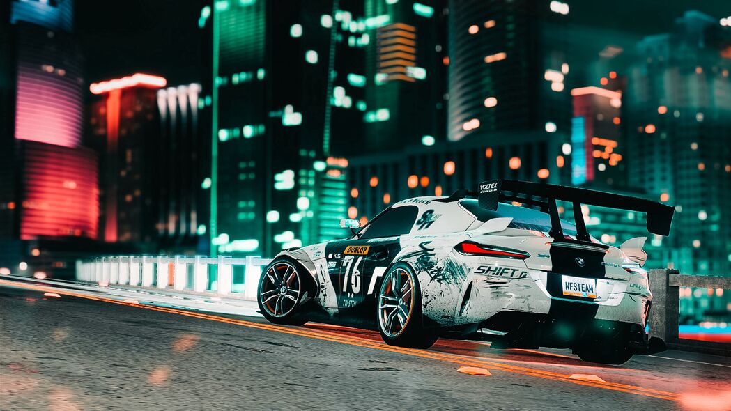 3840x2160超清汽车壁纸，跑车驰骋城市道路，璀璨灯光点亮夜晚背景，免费下载！