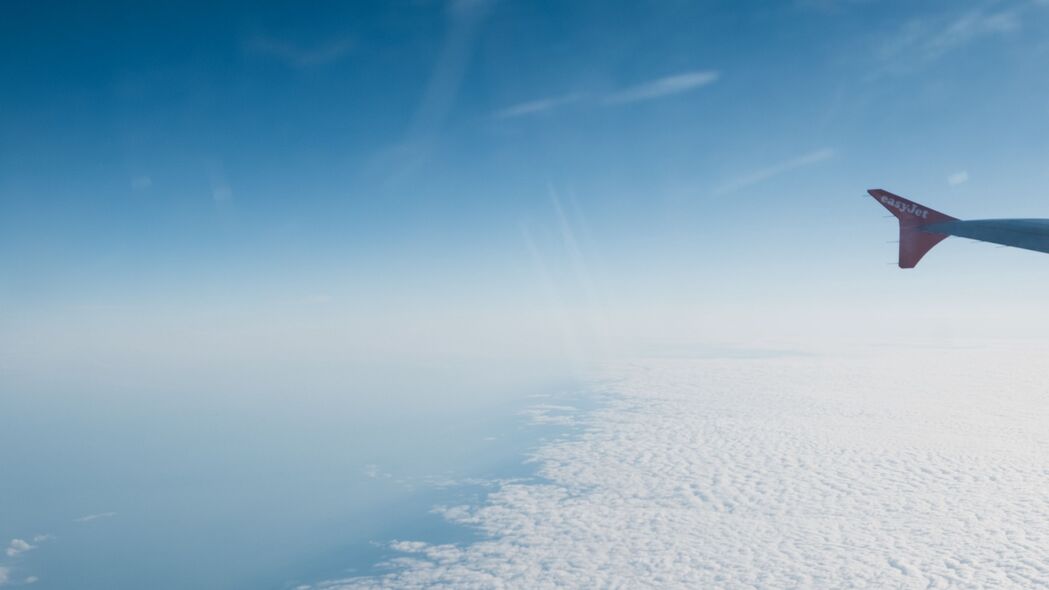 飞机翱翔，机翼划过天空，绝美4K壁纸欣赏，3840x2160高清下载
