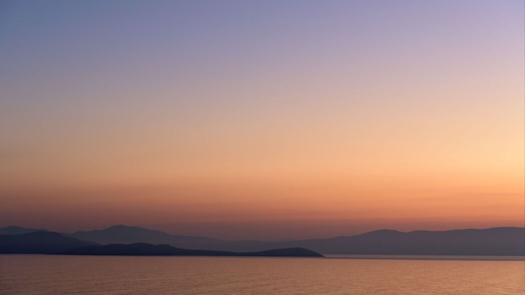 大海日落地平线，雾蒙天空美景呈，4K高清壁纸（3840x2160）下载