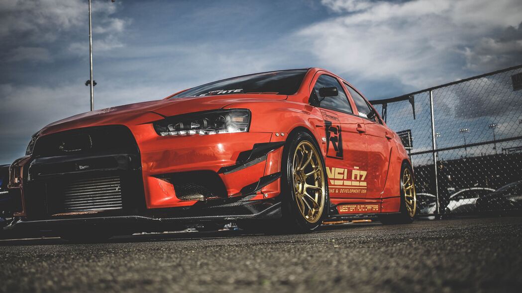 三菱Lancer Evolution X，炫目红色跑车赛车侧视图，高清4K壁纸3840x2160免费下载