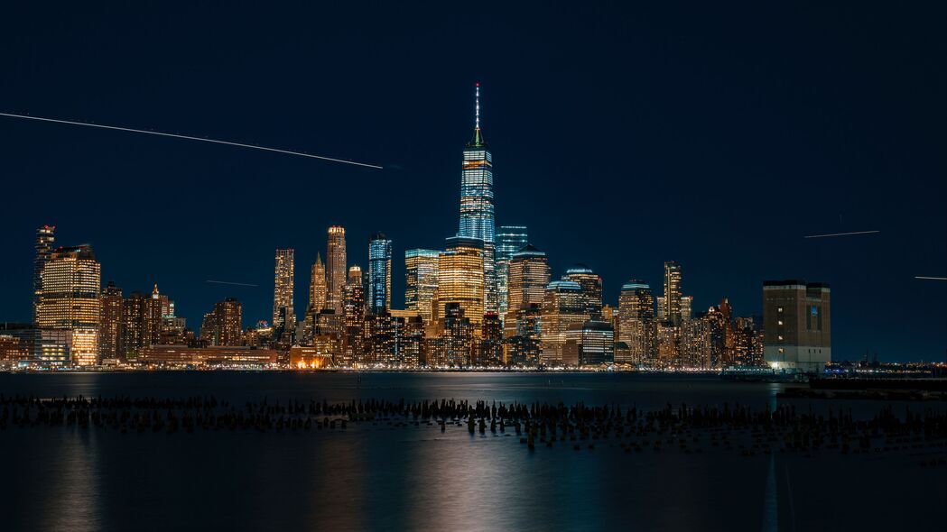 纽约夜城全景，摩天大楼与海滩美景，4K高清壁纸3840x2160免费下载