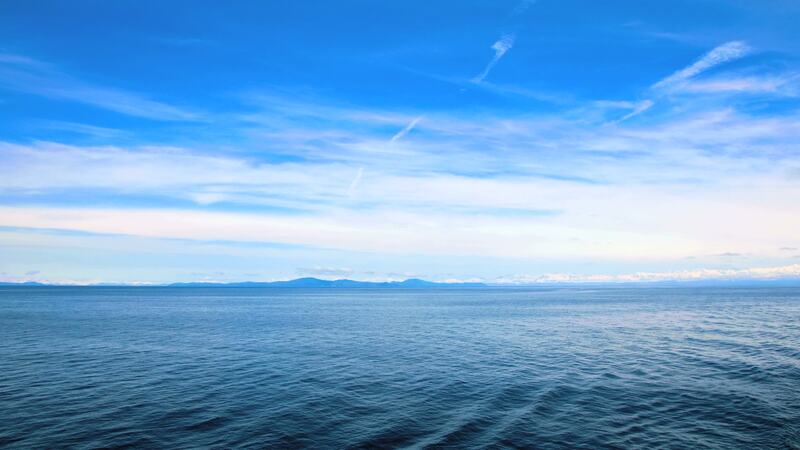 大海与天空交汇之美，高清JPG风景摄影素材，免费下载！