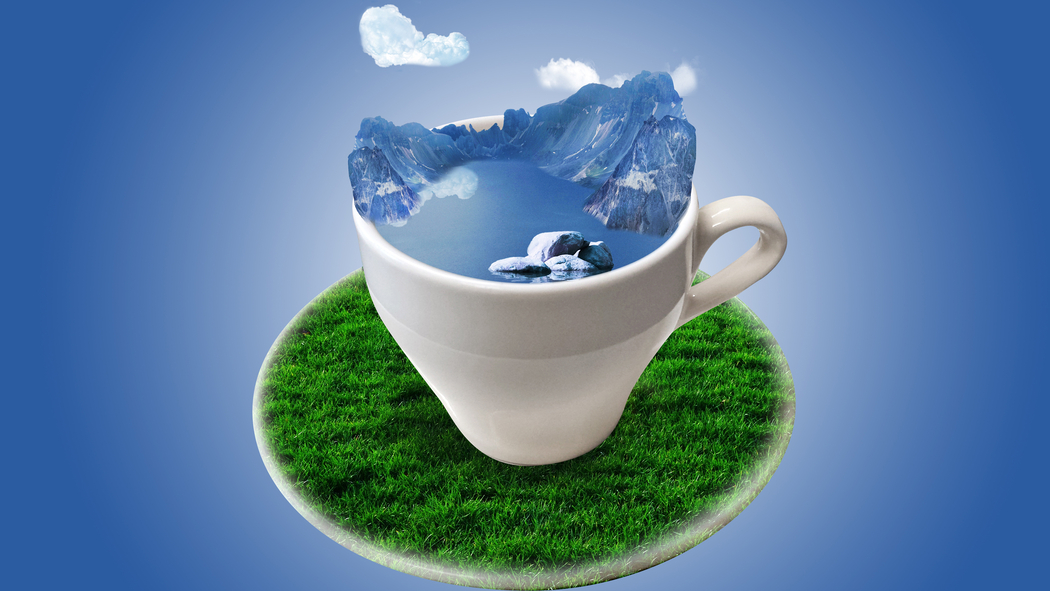 茶杯中的雪山美景创意4K高清壁纸，3000x1688分辨率，免费下载