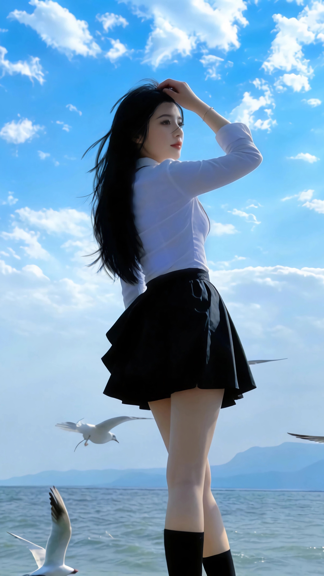 蓝天白云海边黑色裙子长发美女4K高清竖屏手机壁纸2160x3840免费下载