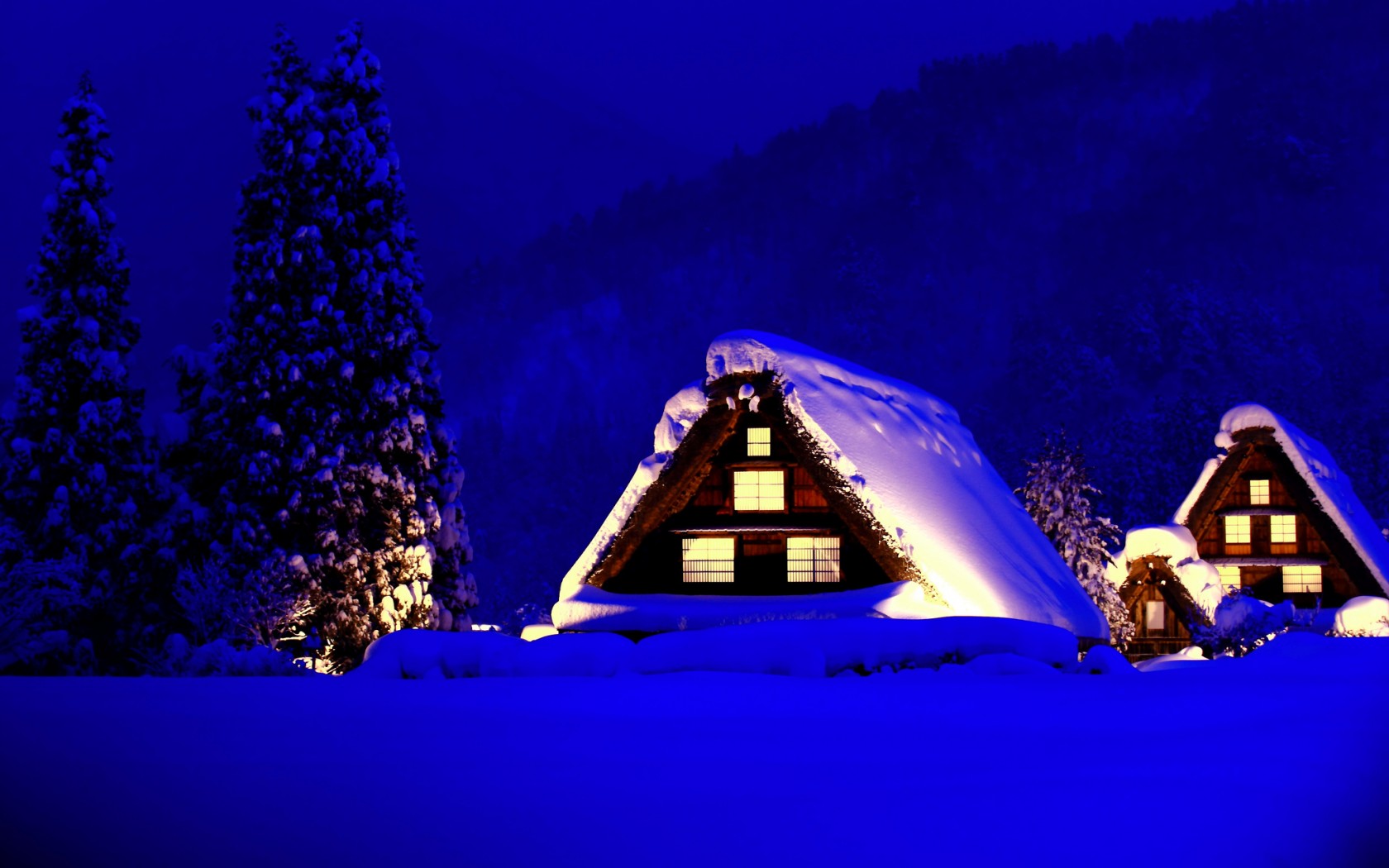 冬日雪景山居，免费高清电脑壁纸，温馨灯光点亮冬日风光