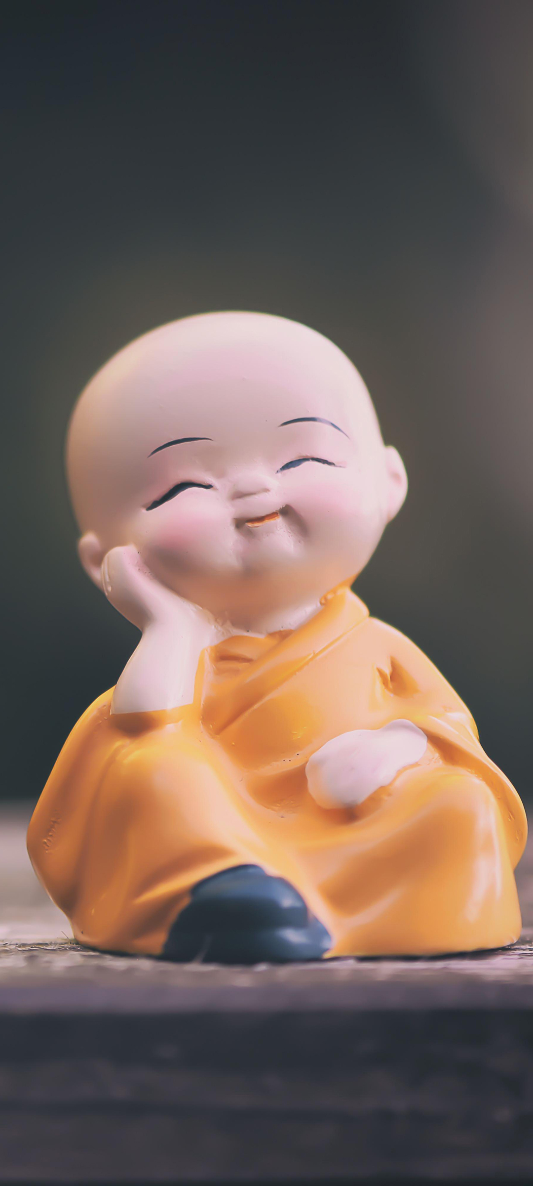免费下载可爱小和尚石像宗教壁纸，美化手机桌面