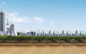黄色挖掘机城市背景