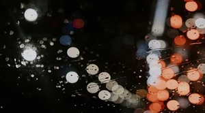 雨天玻璃灯光背景图片